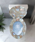 Elongated Resin Toilet Seat for Bathroom with a glossy tiled design, installed over a toilet, showcasing blue water.