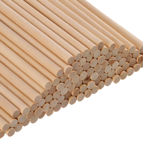 Premium Unfinished Natural Wood Dowel Rods 100 Pack Of Six By One Quarter Inch Smooth Cylinders For Arts And Crafts stacked neatly