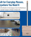 Commercial Upright Dustpan With 30 Inch Aluminum Handle Serrated Broom Comb Edge And Locking Yoke Standing Floor Sweeper tan dustpan in kitchen and warehouse settings.