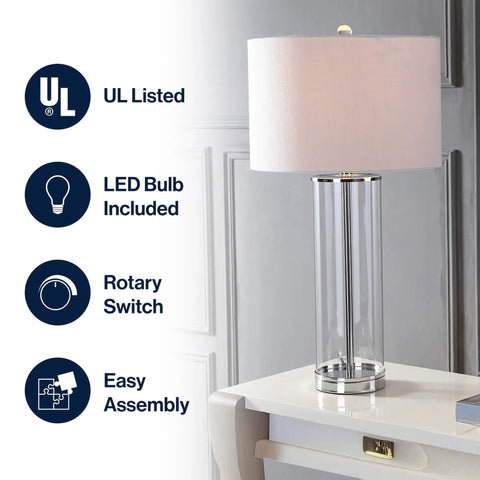 Clear Chrome Modern Glass Table Lamp For Living Room And Bedroom Slick Minimalist Nightstand Bedside Light With White Linen Drum Shade LED Bulb Included ETL Listed For Safe Clean Look next to white wall and table.