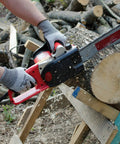 Person using Level 5 Cut Resistant Construction Work Gloves With Foam Nitrile Coating For A Grip Like A Pro And Tactile Feel, High Tear Strength, EN 388, PPE Regulation 2016 425 Compliant, 12 Pairs, Unisex Large while operating a chainsaw and cutting wood.