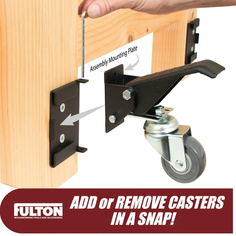Four Rock Solid Retractable Casters Featuring Quick Release Mounting Plates For No Sweat Workbench Relocation And Lets Heavy Shop Gear Roll Out Smooth As Butter, showing assembly of mounting plate on wooden bench.
