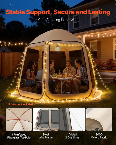 Pop Up Screen House Tent For Four To Eight People 10 By 9.2 Feet Portable Gazebo with netting sides, used in backyard at night.