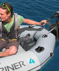 Man using Easy Attach No Fuss Quick Setup Heavy Duty Motor Mount Kit With Marine Plywood And Aluminum Arms on Mariner 4 boat