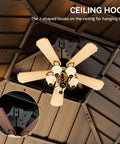 Ceiling hook and fan detail inside 10x10 Ft Hardtop Gazebo With Netting And Curtains Heavy Duty Double Galvanized Steel Roof Ventilated Double Roof Design For Windy Days Outdoor Patio Backyard Deck Lawn Shelter In Gray.
