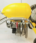 Real Deal Sectional Sewer Snake Machine 1.5 HP Drain Cleaner with yellow motor and spring attachments for tough clogs.