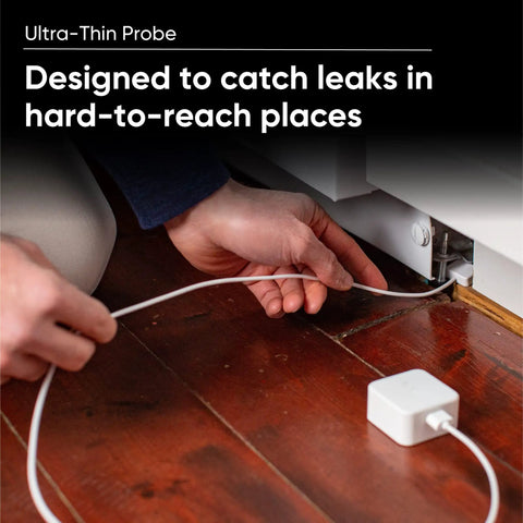 Person installing Leak Sensor Kit With 3 Pack And Single Probe For Home Water Alerts 500 Ft Range From Sense Hub under appliance