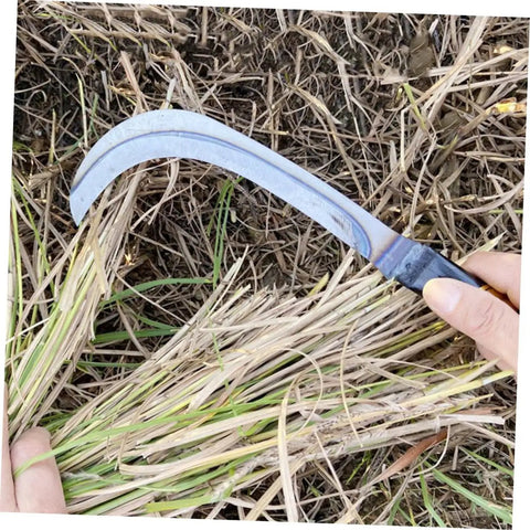Person using Two Piece Manganese Weeding Sickle With Comfy Grip For Gardening And Agriculture Use Sharp Blades For Efficient Harvesting