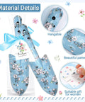 12 Pack Floral Garden Shovel Set For Women Bulk Garden Tools Gift Bundle with blue floral shovels, thank you cards, and ribbons