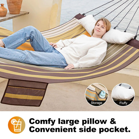 Woman relaxing on 14 Foot Two Person Outdoor Hammock With Quick Dry Textilene Fabric and pillow, showing side pocket.