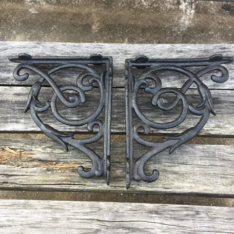 Rock Solid Cast Iron Shelf Brackets Heavy Duty Wall Mount Braces with vintage design, 6.8 x 5.7 inches, black finish.