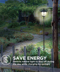 Sun Powered Outdoor Solar Lamp Post Light 65 Inch Tall Black Garden Decor With Warm LED No Wiring Easy Setup Durable Pathway Post Light For Yard Patio at night, illuminating garden path.