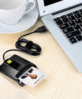 CAC Card Reader for DOD Military USB Common Access Card Reader for Mac and Windows next to laptop and cup on table