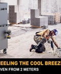 Construction worker using Dewalt 20V Battery Compatible Portable Jobsite Fan 7 Inch Cordless Works Fan on tool cart