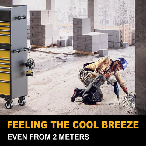 Construction worker using Dewalt 20V Battery Compatible Portable Jobsite Fan 7 Inch Cordless Works Fan on tool cart