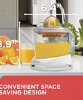 Electric Citrus Juicer With 32 Ounce Pitcher No Fuss Pressure Activated Adjustable Pulp Control Self Reversing Reamer on counter