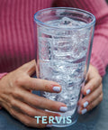 Person holding Tervis tumbler with ice, Washington Commanders 24oz Double Wall Insulated Tumbler Cup Keeps Drinks Cold or Hot All Day