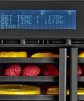 Smart digital control panel displaying settings on Super Durable 10 Tray Electric Food Dehydrator with fruits inside.