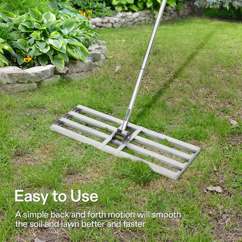 30 Inch Lawn Leveling Rake With 7 Foot Adjustable Handle Heavy Duty Stainless Steel Rustproof Yard Rake in use on grass