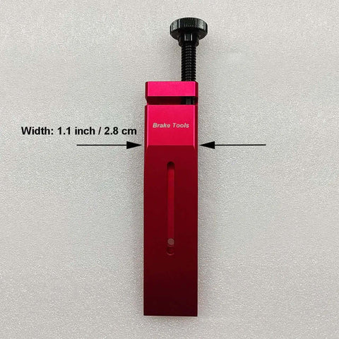 SRAM Hydraulic Disc Brake Caliper Piston Press Tool, 1.1 inch width, red aluminum, used for 2 and 4 piston calipers.