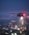 Mavic 2 Pro Drone Quadcopter With Hasselblad Camera, 3 Axis Gimbal, HDR 4K Video, Adjustable Aperture flying over city at night