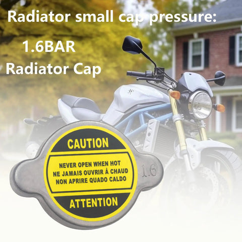 High Pressure Radiator Cap 1.6 Bar 23 Psi For Powersports in front of a motorcycle, silver cap with caution label, 1.6 bar marking