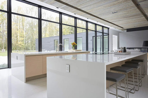 Modern kitchen with Tamper-Resistant Self-Test GFCI Outlet 15A White Finish With Matching Wall Plate, large windows, sleek design