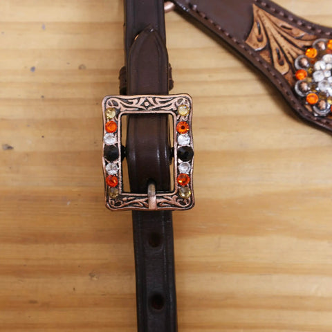 Custom Western Leather Headstall And Breast Collar Tack Set showcasing antique copper buckle with colorful inlays on leather.