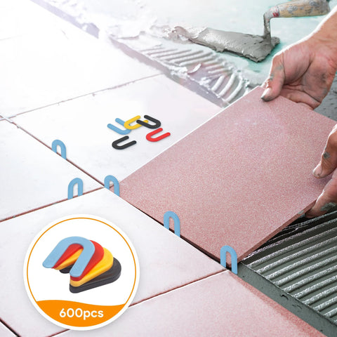 ZUXUSE plastic horseshoe tile shims, 600 pcs, color-coded blue, red, yellow and black for tile leveling.