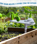 Hands On Weather And Climate Lab 5 In 1 Meteorology Station Kit with wind vane, anemometer, and rain gauge installed in garden
