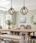 Farmhouse Wood Pendant Light for Kitchen Island with Adjustable Chain 1 Light Rustic Hanging Fixture in a dining room setting