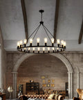 Rustic Wagon Wheel Swing Arm Chandelier 40 Inch 20 Light Farmhouse Ceiling Fixture for living room displayed in elegant setting