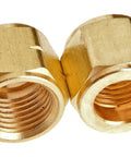 Two brass 1/4-inch hose repair fittings for oxygen/acetylene hoses.