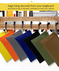 Heavy Duty Canvas Tool Bag Organizer Set Of 7 Pouches In Assorted Colors 12.5 Inch By 7 Inch hanging on pegboard hooks