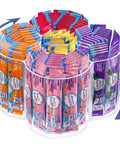 360 Rotating Drink Packet Organizer Acrylic Lazy Susan displaying assorted beverage mixes in clear compartments.