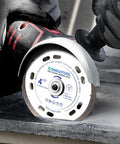 Person using Ultra Thin Four And A Half Inch Tile Cutter Diamond Saw Blades Set For Angle Grinder Indestructible Disc