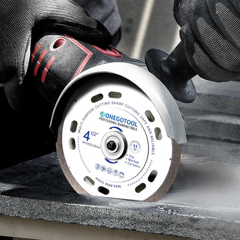 Person using Ultra Thin Four And A Half Inch Tile Cutter Diamond Saw Blades Set For Angle Grinder Indestructible Disc