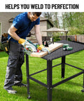 Man using Beefy Heavy Duty 36x24 Welding Table With Five Eighth Inch Tool Holes And Adjustable Legs 1500 Pound Steel Fabrication Workbench For Welding Sawing Auto Repair And Fixturing in garden