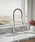 Slick Stainless Steel Kitchen Sink Faucet With Built In Soap Dispenser And Heavy Duty Pull Down Sprayer in modern kitchen setting.