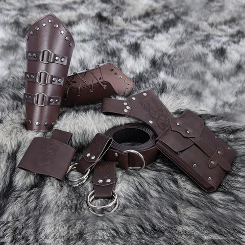 Epic Medieval Renaissance Sword Belt Set With Leather Bracers Pirate Costume Accessories Including Sword Holster Frog Skirt Hikes And Coin Pouch Brown Leather LARP Gear For Women And Viking Themed Events, displayed on fur