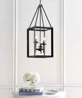 Oil Rubbed Bronze 12 Inch 3 Light Lantern Pendant LED Ceiling Light for Foyer Kitchen Island and Entryway with Clear Glass Shade Traditional Metal Fixture ETL Listed hanging above white table with books and flowers