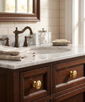 Handmade Solid Brass Cabinet Knobs Round Unlacquered Drawer Pulls Developing Rich Antique Patina Over Time on bathroom vanity.