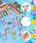 All In One Stationery Party Pack For Kids With 24 Goodie Bags Mini Notebooks Multicolor Pens Slap Bracelets Motivational Bookmarks Tattoos Classroom Gifts Class Rewards And Prizes, featuring multicolor pens with animal toppers on blue background.