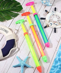Colorful 36 Pack Crayon Water Guns 16 Inch Long Water Shooters With Easy Grip Handles displayed by poolside decor.