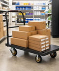 Heavy Duty 2000 Lb Steel Platform Cart With 47 By 24 Inch Anti Slip Platform, Detachable Handle For Easy Storage, 360 Degree Swivel Casters, A Real Warehouse Workhorse For Pros. loaded with boxes in aisle