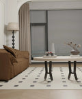 Living room with a coffee table featuring heavy duty metal table legs 28 inch high 20 inch wide set of 2 black T shape with adjustable feet