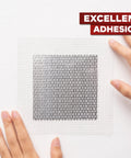 Person applying a patch from Heavy Duty Aluminum Drywall Patch Kit 12 Pack With Fiberglass Mesh Mess Free Self Adhesive Wall And Ceiling Hole Patches