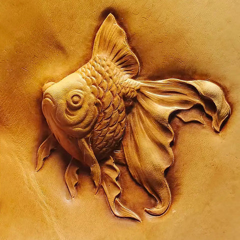 Carved goldfish design on leather using Double Beveler Stamp Set For Leathercraft, showcasing precise details and texture.