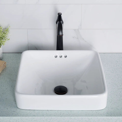 Elavo Square Vessel Sink With Overflow White Porcelain Ceramic Semi Recessed Bathroom Vanity Sink 16 And A Half Inch Scratch Resistant Easy To Clean High Gloss Glaze, installed on a modern countertop