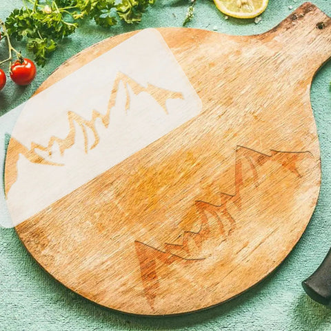 Super Slick Mountain Range Router Template Hella Thick Clear Acrylic Charcuterie Stencil For Awesome Woodworking Builds Pretty Tough Kitchen Cutting Board Pattern Jig on wooden cutting board.